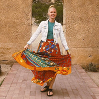 Colorful sari wrap skirt from Darn Good Yarn featuring vibrant patterns and flowing fabric, styled as a versatile clothing accessory.