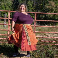 Darn Good Yarn Original Sari Wrap Skirt in vibrant colorful fabric, styled as a bohemian clothing accessory.