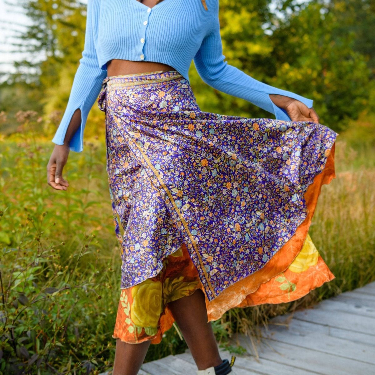 Colorful sari wrap skirt by Darn Good Yarn, featuring vibrant fabric and a versatile design in a clothing and accessories style.