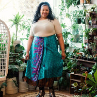 Colorful sari wrap skirt by Darn Good Yarn, showcasing vibrant fabric and traditional design in a stylish clothing accessory.