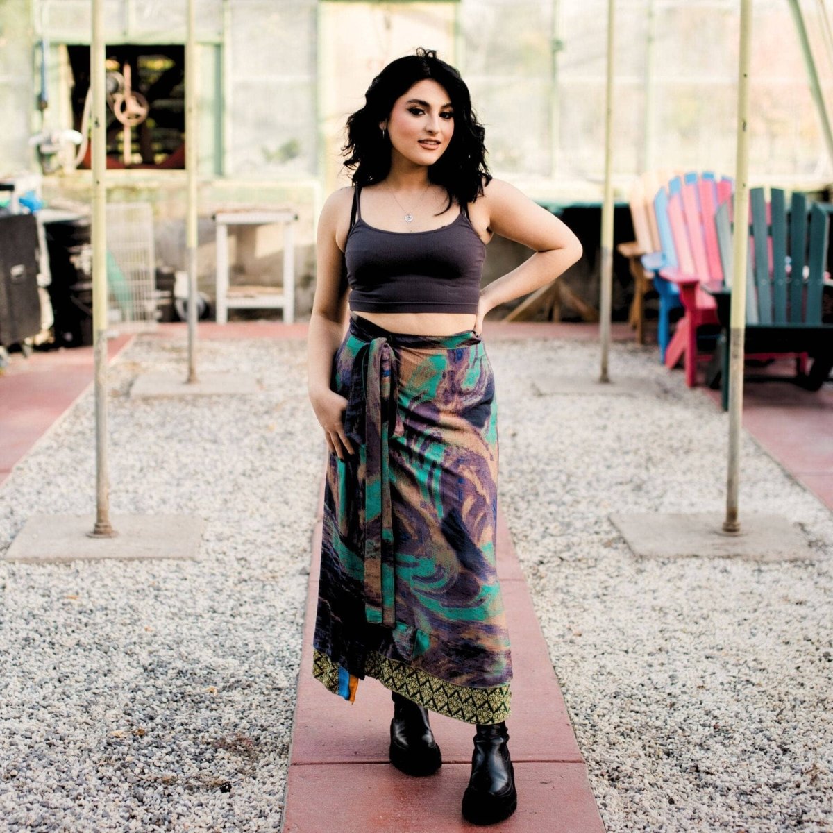 Darn Good Yarn Original Sari Wrap Skirt in vibrant fabric, styled for a bohemian look, showcasing its colorful, flowing design.