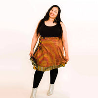 Colorful sari wrap skirt by Darn Good Yarn, showcasing vibrant fabric and flowing design for bohemian-style clothing.