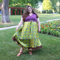 Colorful Darn Good Yarn The Original Sari Wrap Skirt made from vibrant sari fabric, styled for a boho-chic look.