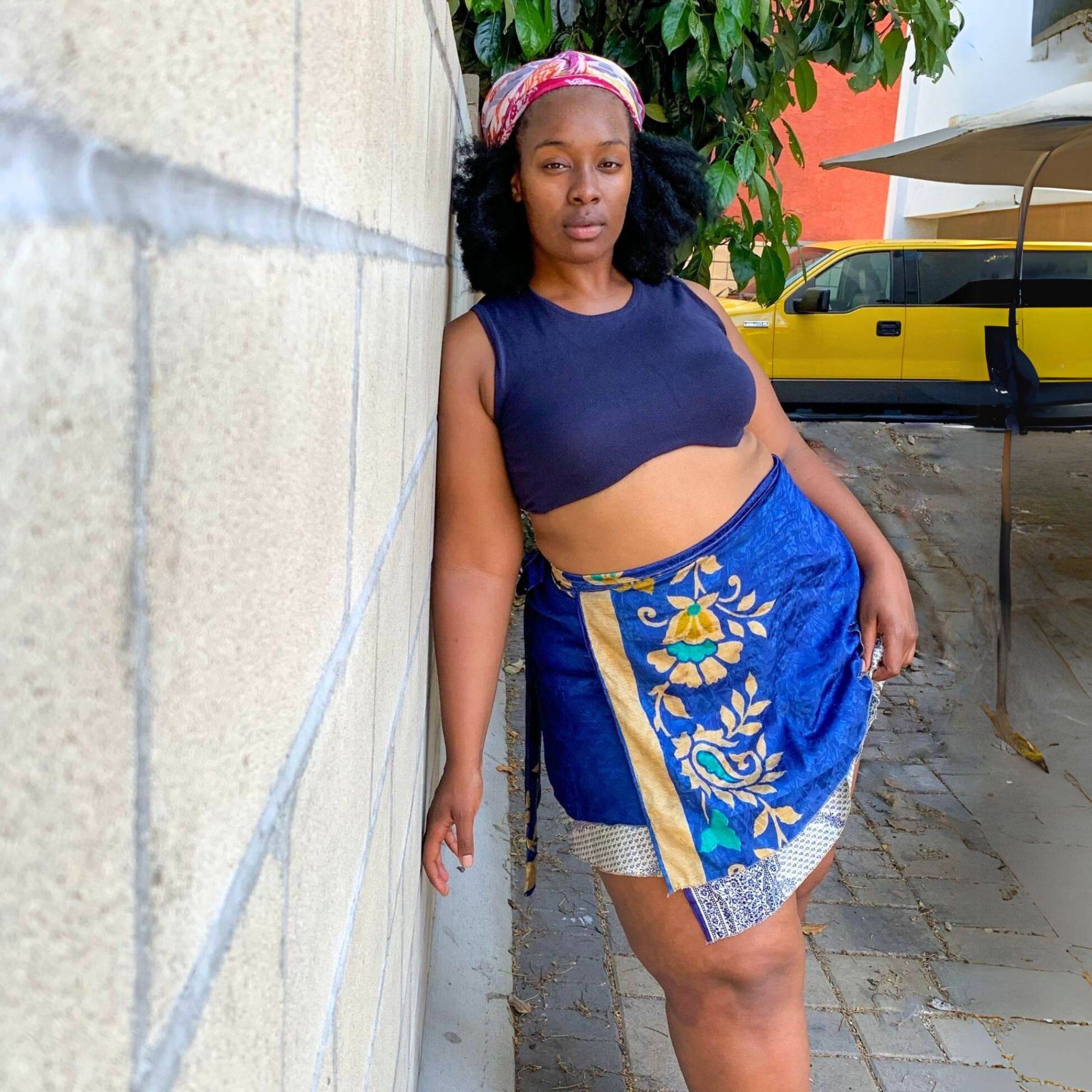 Colorful The Original Sari Wrap Skirt by Darn Good Yarn, flowing fabric with intricate patterns, styled for boho fashion.