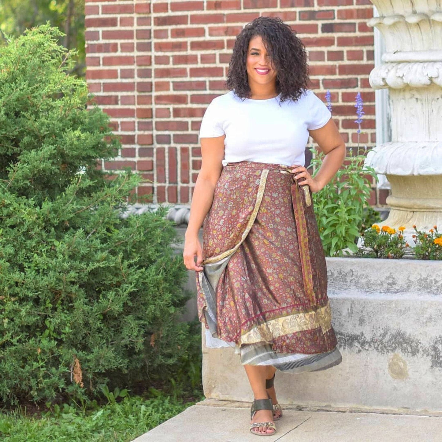 Colorful sari wrap skirt from Darn Good Yarn, showcasing vibrant fabric and traditional design, styled as a versatile clothing accessory.