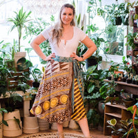 Colorful sari wrap skirt by Darn Good Yarn showing vibrant fabric and relaxed fit, perfect for boho-style clothing and accessories.