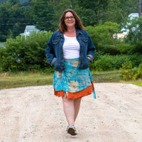 Colorful sari wrap skirt by Darn Good Yarn featuring vibrant patterns and flowing fabric, perfect for bohemian-style clothing.
