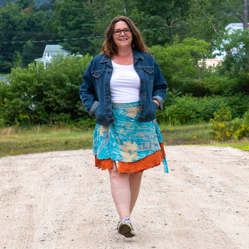 Colorful sari wrap skirt by Darn Good Yarn featuring vibrant patterns and flowing fabric, perfect for bohemian-style clothing.