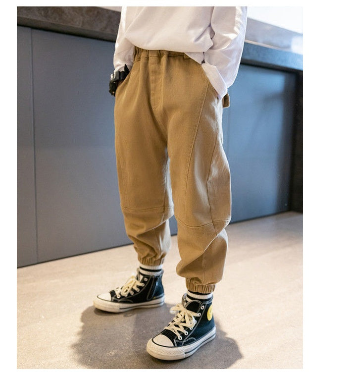 Children's boys' footwear overalls trousers from Ancient Energy, featuring durable fabric and casual style for middle and older kids.