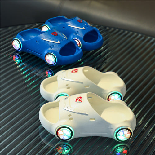 Kids glowing cartoon car slippers by Ancient Energy, lightweight luminous children’s sandals with slip-resistant soles, perfect for summer beach wear.