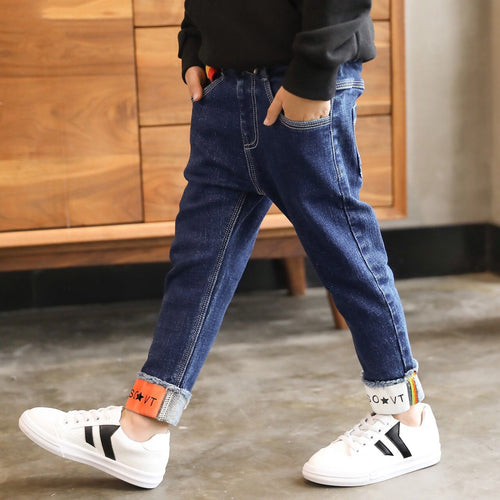 Children's boys' denim trousers by Ancient Energy, featuring classic blue denim fabric and a comfortable fit for kids.