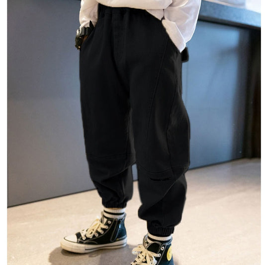 Ancient Energy boys' footwear overalls trousers for middle and older children, shown in a casual style with adjustable straps and pockets.