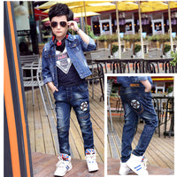 Ancient Energy boys' autumn and winter velvet one-piece jeans, cozy and warm for cold weather, shown in a natural pose.