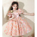 Ladies' blush floral puff sleeve mini dress by Mandotos International, featuring a feminine floral print and stylish puff sleeves.