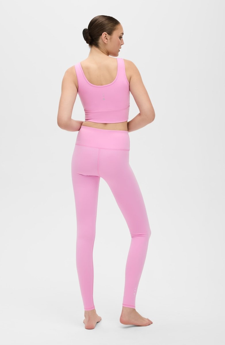 Elastique Athletics Rise Leggings in Vie en Rose color, close-up of high-waist, stretchy athletic bottoms with sleek fabric.