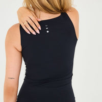 Elastique Athletics Iconic MicroPerle Tank top in a fitted style, featuring a sleek design and lightweight fabric for active wear.