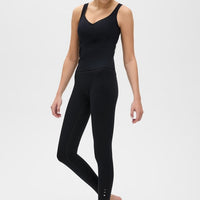 Elastique Athletics Iconic MicroPerle Tank top in black, lightweight sleeveless athletic shirt, close-up view.