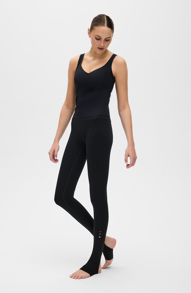 Elastique Athletics Iconic MicroPerle Tank top in black, lightweight sleeveless athletic shirt, close-up view.