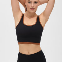 Elastique Athletics Lisse Bra in Chestnut and Black, showcasing a stylish, supportive sports bra with a sleek design.