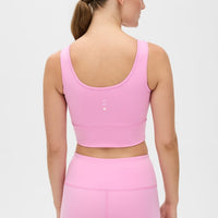 Elastique Athletics Rise Bra in Vie en Rose color, a sporty and supportive women's top with a sleek design.