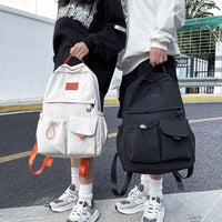 Ancient Energy nylon school backpack for junior high students, featuring multiple compartments and adjustable straps.