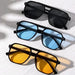 Vintage unisex square sunglasses with black lenses, designer style, UV400 protection, suitable for men and women.