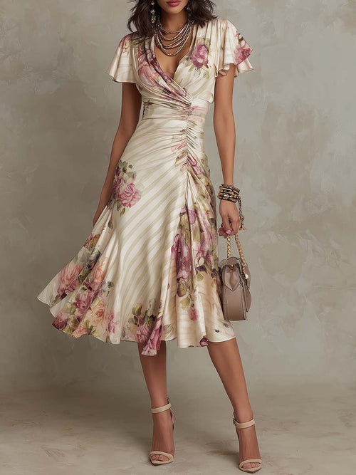 FitiqueFit ruffled hem maxi dress with v-neck, satin fabric, color block design, and A-line silhouette.
