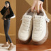 Color block height increasing sneakers by FitiqueFit featuring lace-up low-top design and modern style in vibrant colors.