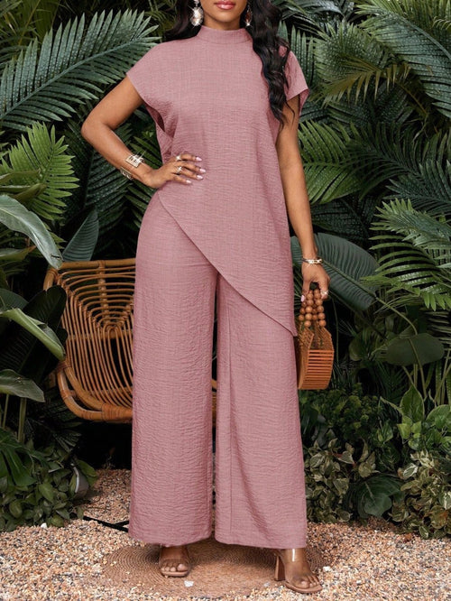Asymmetrical sleeveless top and pants set for women by FitiqueFit, featuring a modern two-piece design in stylish fabric.