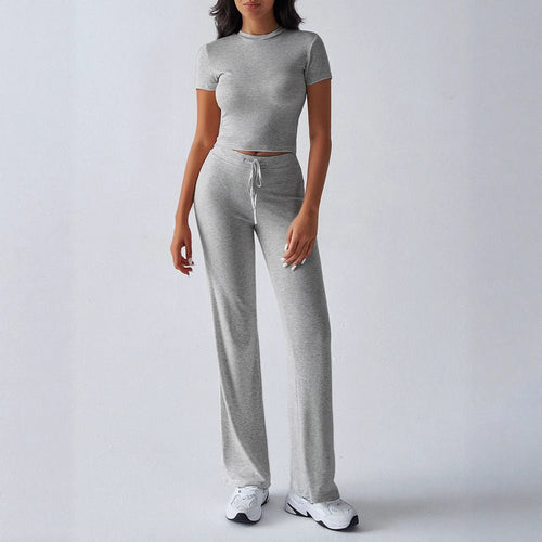 FitiqueFit crew neck short sleeve top and full-length pants set in solid color, available in 10 color options.