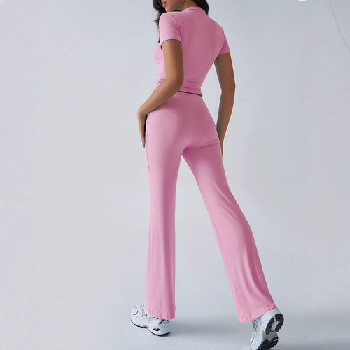 FitiqueFit crew neck short sleeve top and full-length pants two-piece set in solid color, available in 10 vibrant shades.