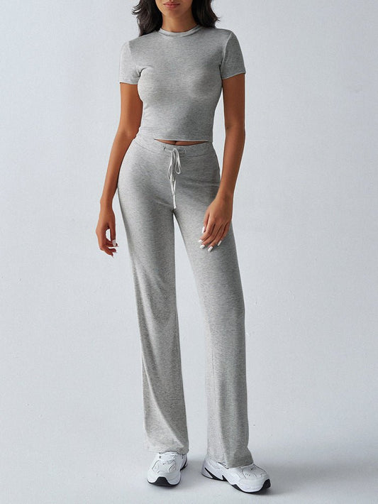 FitiqueFit crew neck short sleeve top and full-length pants set in solid color, available in 10 color options.