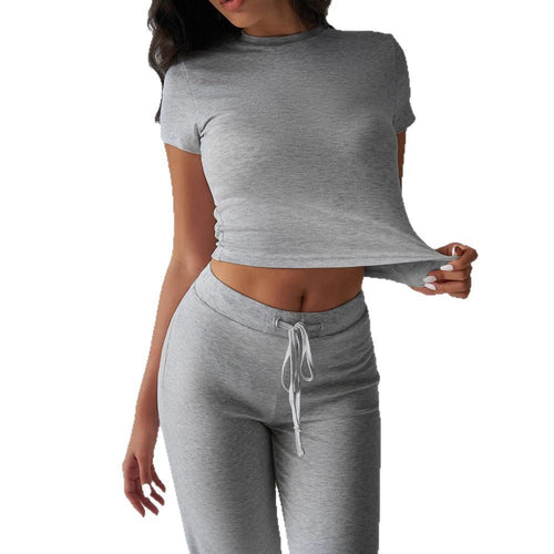 FitiqueFit crew neck short sleeve top and full-length pants two-piece set in solid colors, perfect for casual wear.