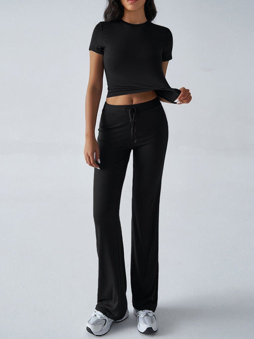 FitiqueFit two-piece crew neck short sleeve top and full-length pants set in solid color, available in 10 colors.