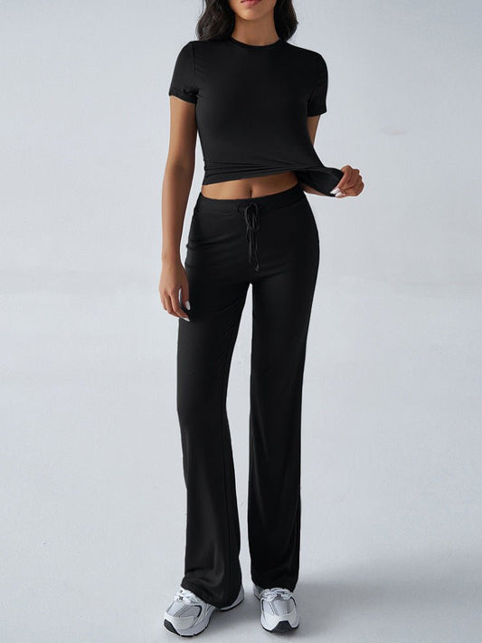 FitiqueFit two-piece crew neck short sleeve top and full-length pants set in solid color, available in 10 colors.
