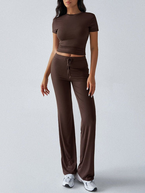 FitiqueFit crew neck short sleeve top and full-length pants two-piece set in solid color, available in 10 colors.