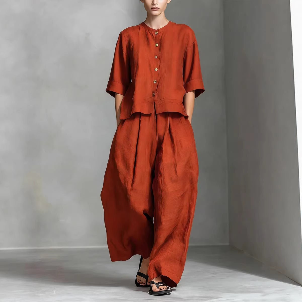 FitiqueFit three-quarter sleeve shirt and loose trousers two-piece set, casual stylish clothing for women.