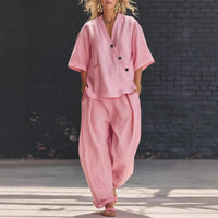 FitiqueFit two-piece set featuring a V-neck short sleeve top and high-waist trousers, stylish and comfortable for casual wear.