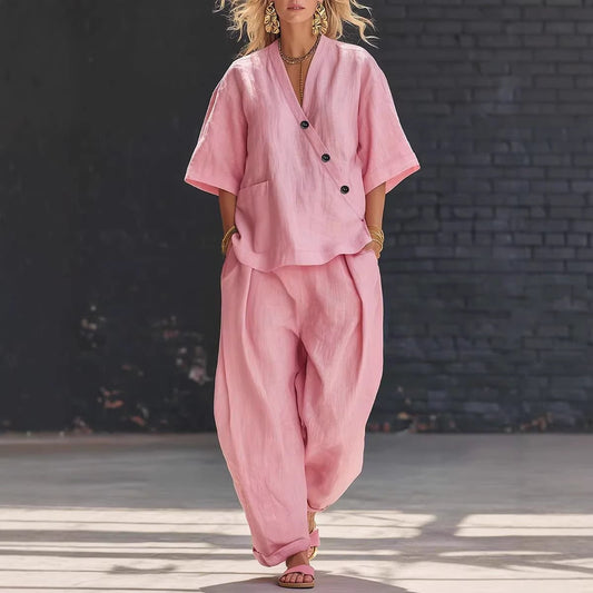 FitiqueFit two-piece set featuring a V-neck short sleeve top and high-waist trousers, stylish and comfortable for casual wear.