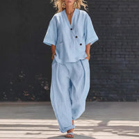 FitiqueFit two-piece set featuring a V-neck short sleeve top and high-waist trousers, stylish and comfortable for casual wear.