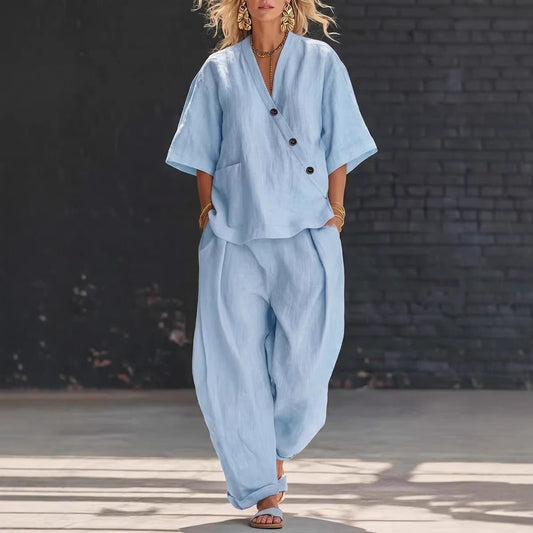 FitiqueFit two-piece set featuring a V-neck short sleeve top and high-waist trousers, stylish and comfortable for casual wear.