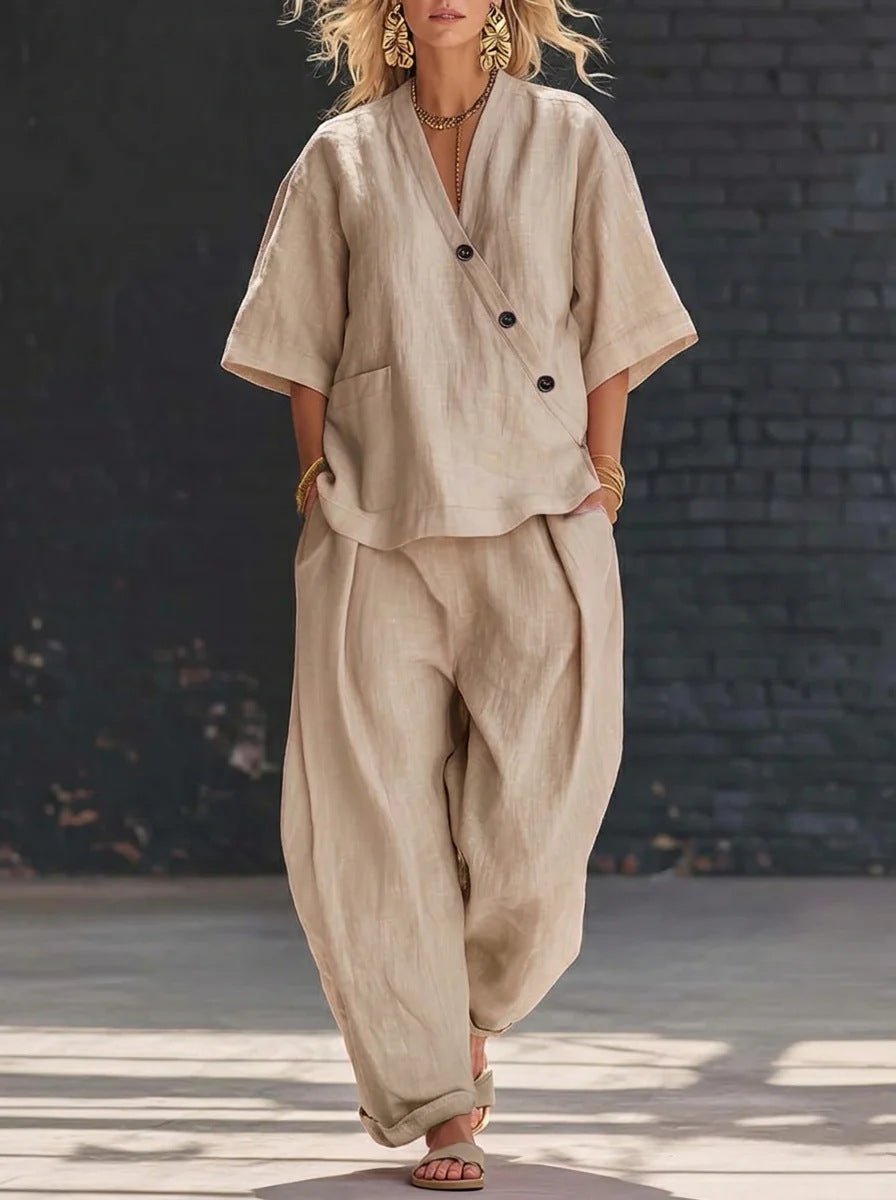 FitiqueFit V-neck short sleeve top and high-waist trousers two-piece set, shown on a model with neutral background