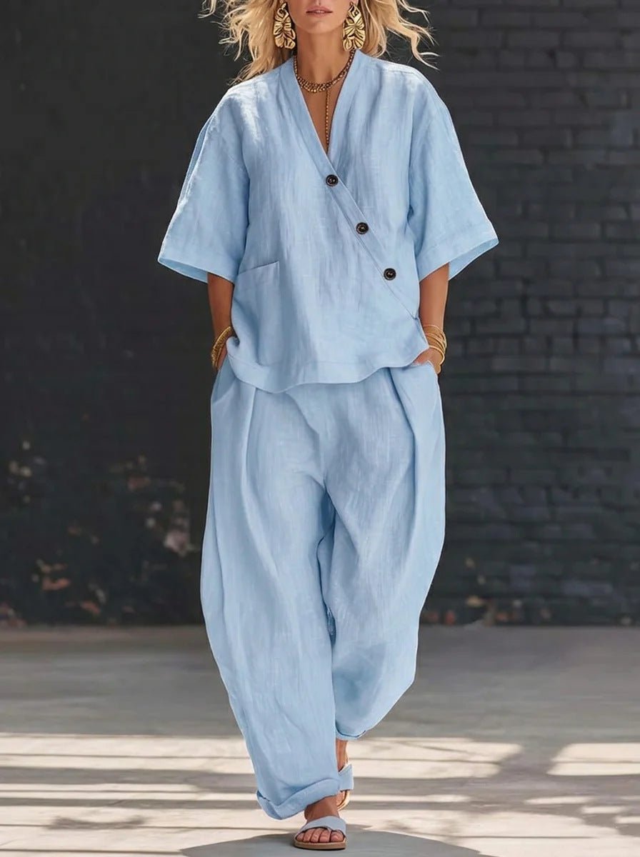 FitiqueFit V-neck short sleeve top and high-waist trousers two-piece set, displayed on a model. Stylish and casual fashion ensemble.