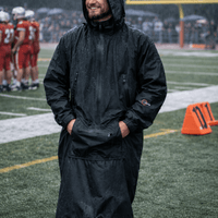 IWOM WeatherShield Convertible Jacket shown worn open, displaying adjustable features and durable fabric for versatile weather protection.