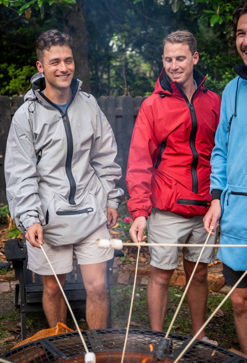 IWOM WeatherShield Convertible Jacket displayed on a model, showing adjustable features and water-resistant fabric in a casual outdoor setting.