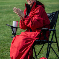IWOM WeatherShield Convertible Jacket shown on model, featuring adjustable hood, multiple pockets, and waterproof fabric for versatile protection.