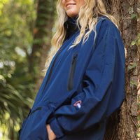 IWOM WeatherShield Convertible Jacket shown in black, featuring a hood, zip front, and adjustable cuffs for versatile weather protection.