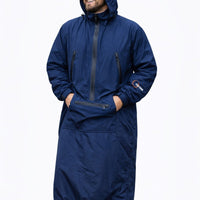 IWOM WeatherShield Convertible Jacket shown in black with hood, multiple pockets, and adjustable cuffs, suitable for outdoor weather.