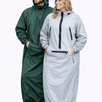 IWOM WeatherShield Convertible Jacket in black, featuring adjustable hood, multiple pockets, and waterproof fabric for versatile weather protection.