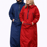 IWOM WeatherShield Convertible Jacket displayed in black, featuring adjustable hood, multiple pockets, and waterproof fabric.
